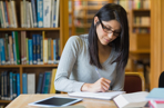 Woman studying in a library