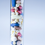 Test tube containing pills