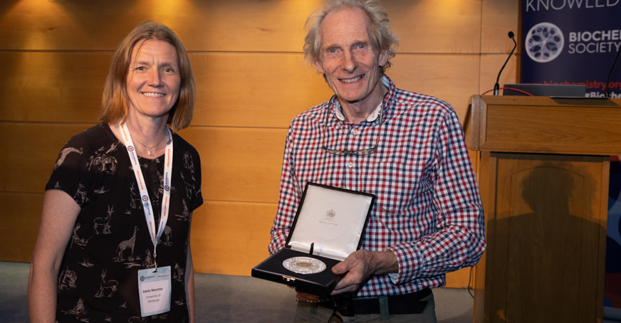 Professor Kim Nasmyth receiving their award