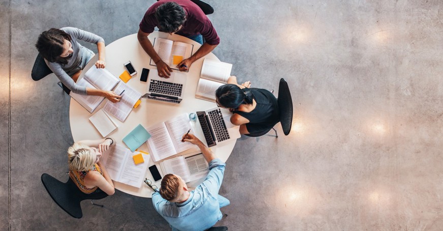 Image of a panel having a meeting