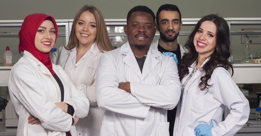 Group of students in lab coats