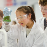 Group of children doing a scientific outreach activity