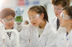 Group of children doing a scientific outreach activity
