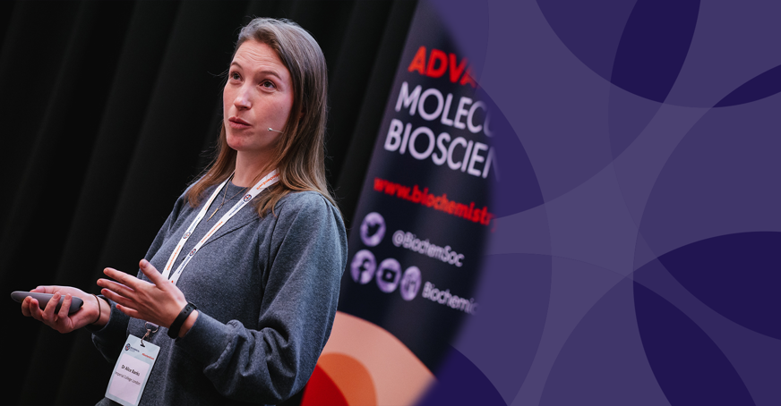 Early career member giving a talk at a conference