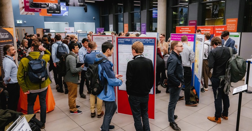 Attendees at a poster session during a Biochemical Society event