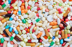 Image of different coloured medication and pills 