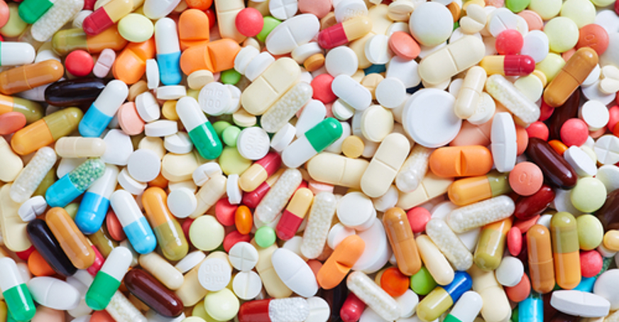 Image of different coloured medication and pills