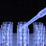 Food scientist working with test tubes
