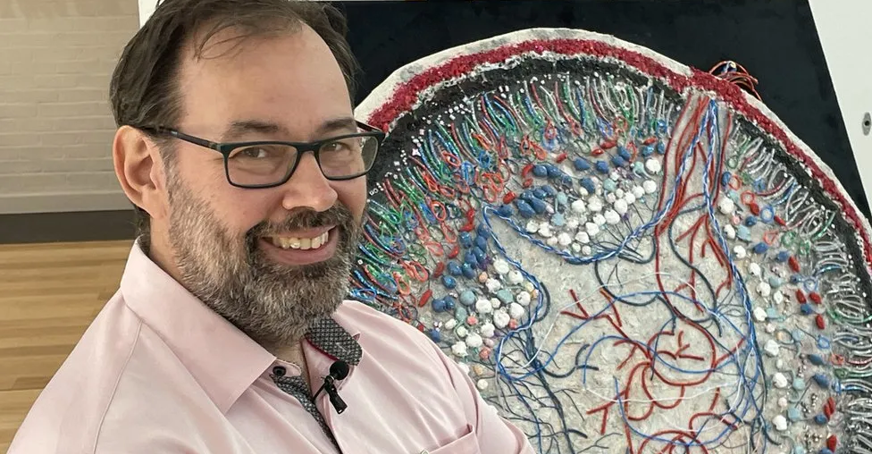 Adrian Liston at the sensory science exhibit
