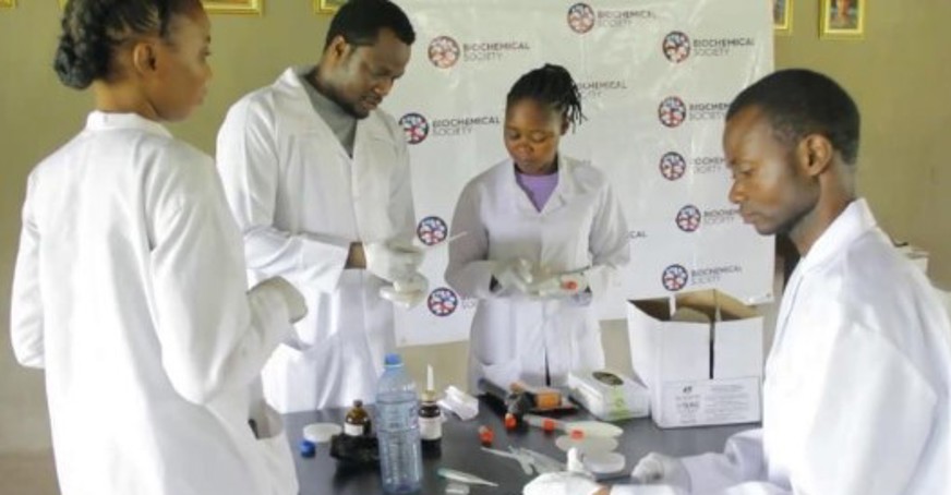 Group of students conducting an experiment