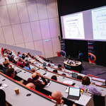 Attendees watching a speaker session at Synthetic Biology 2022