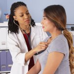 Doctor treating a patient