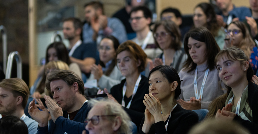 Group of people attending a conference