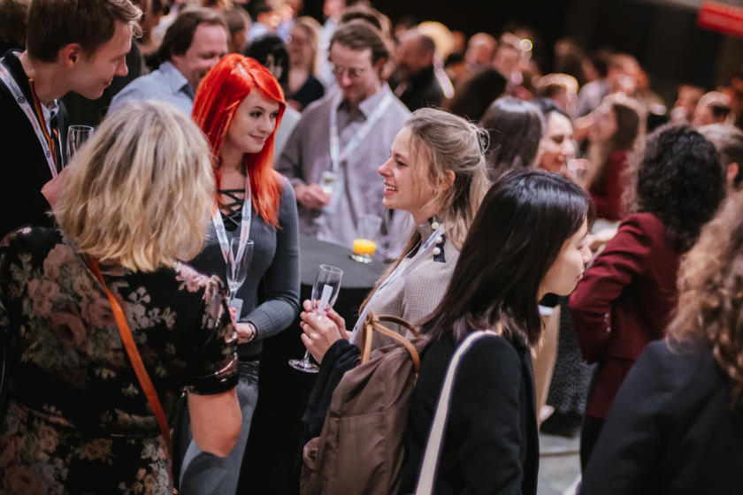 Conference delegates netwokring during a drinks reception
