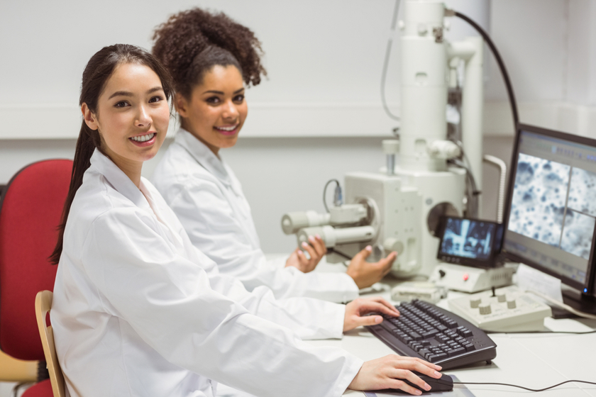 Two students working in a lab