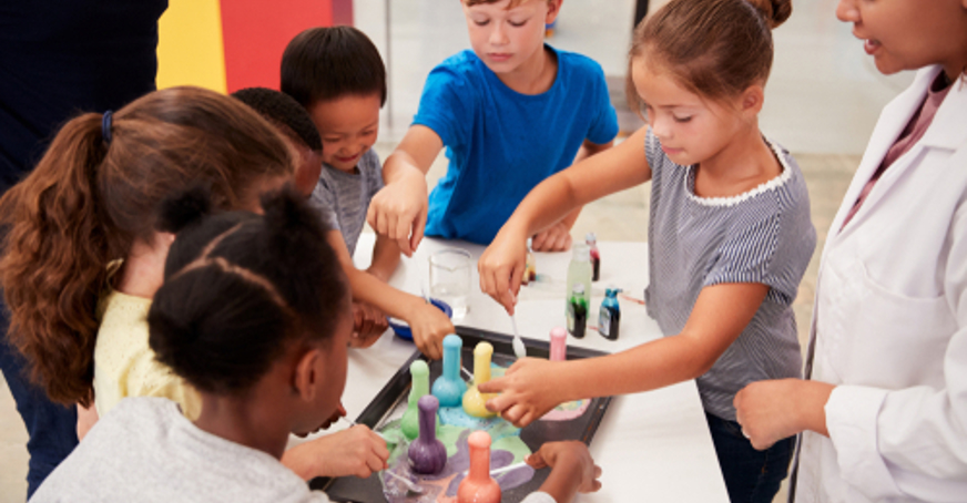 Group of children conducting a science experiment