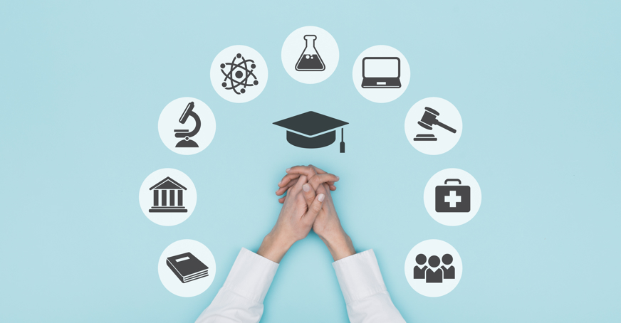 Icons depicting the variety of possible career paths in the sciences surrounding a pair of closed hands.
