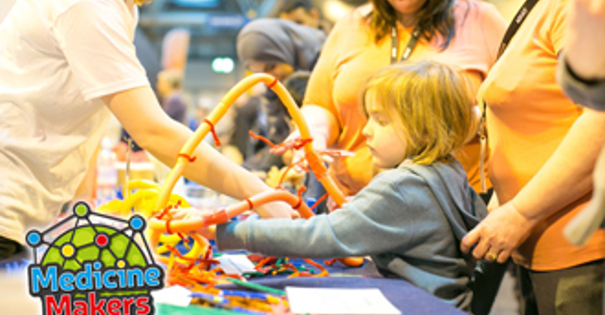 Medicine Makers activity, adults supporting a child's learning development about science