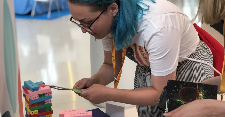 woman playing scientific outreach game