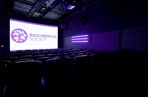 Empty conference room with the Biochemical Society logo on the screen